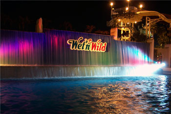 close up of vibrant LED colors of blue green, purple pink, red and bright white on Waterfall ausing SGM Palcos, Surf Lagoon, Wet 'n Wild Orlando Water park (Closed December 31, 2016), Orlando, Florida USA