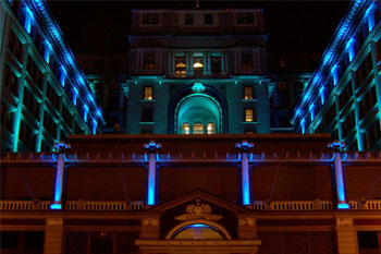 US Grant Hotel lit up at night with purple LEDs