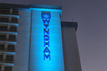 DVT Light PJ-5 RGBW Outdoor LED Wash Lights shining on Wyndham logo Wyndham I-Drive Avanti Resort & Conference Center, Orlando, Florida