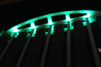 Solaire at the Plaza Condos of Orlando at night with green Quadro 24 LEDs