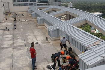 Installation crew on the roof of Solaire at the Plaza Condos of Orlando