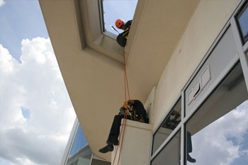 Ropeworks - Mistras Group, Inc. Noah, Steve installing LED fixtures on Solaire at the Plaza Condos of Orlando
