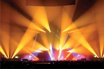 stage using 46 SGM Giotto 400 Spot CMY moving head lights during band Coldplay's Twisted Logic World Tour, United Kingdom