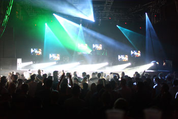 moving head lights with beams of green white blue crowd in front of stage British DJs Sasha-Digweed - House of Blues Orlando, Florida