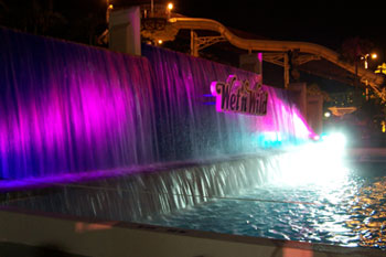 close up of vibrant LED colors of purple pink and bright whiteon Waterfall using SGM Palcos, Surf Lagoon, Wet 'n Wild Orlando Water park (Closed December 31, 2016), Orlando, Florida USA