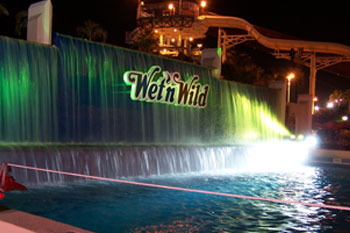close up of vibrant LED colors of blue green, purple pink, orang yellow and bright white on Waterfall ausing SGM Palcos, Surf Lagoon, Wet 'n Wild Orlando Water park (Closed December 31, 2016), Orlando, Florida USA