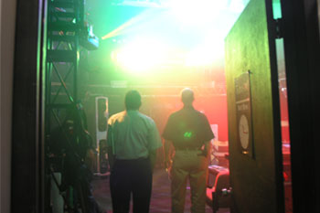 aerial view of guest talking in Exhibitor booths in the warehouse at the Rental & Staging Roadshow 2008 hosted by Techni-Lux, Orlando, Florida USA