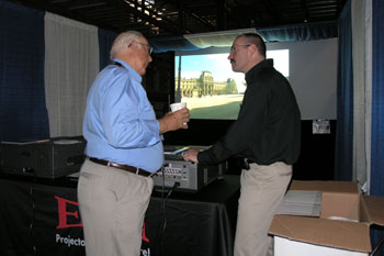 EIKI reps at their booth Rental & Staging Roadshow 2009 hosted by Techni-Lux, Orlando, Florida USA