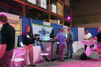 guests at various booths at the Rental & Staging Roadshow 2009 hosted by Techni-Lux, Orlando, Florida USA