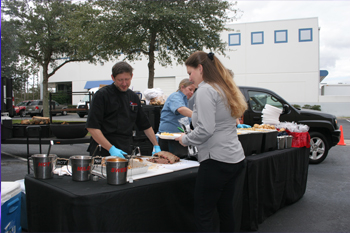 guests getting lunch catered by Bubbalou's Bodacious BBQ at Techni-Lux Technology Day 2018, Orlando, Florida USA