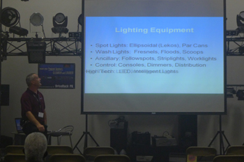 guests listening to a seminar on LEDs with Techni-Lux in-house lighting desginer Tony Hansen in showroom,Techni-Lux 20th Anniversary Open House 2010, Orlando, Florida USA