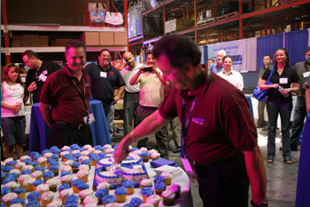 President Luciano Salvati cake cutting ceremony at Techni-Lux 20th Anniversary Open House 2010, Orlando, Florida USA