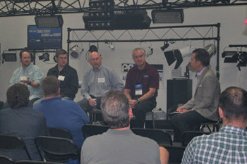 guests in showroom listening to a Panel Discussion Techni-Lux 25th Anniversary Open House 2016, Orlando, Florida USA