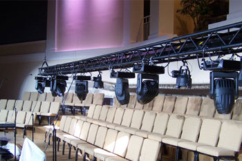 closer view of Truss rigging mounted of SGM Giotto Spot fixutres on a matt black finish steel truss about to be raised up above the choir  stage, Forestville Baptist Church, Greenville, SC, USA