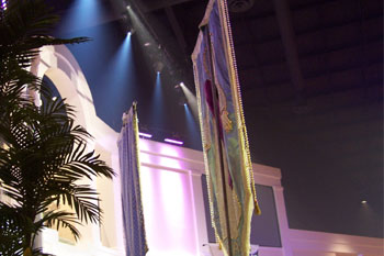 closer view behind the banners of SGM Giotto Spot fixutres and  SGM Ribalta LED RGB color mixing fixtures shining down the back walls, Forestville Baptist Church, Greenville, SC, USA