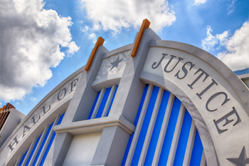 Interactive dark ride Justice League: Battle For Metropolis 4D building exterior at Six Flags Theme Parks, U.S.A.