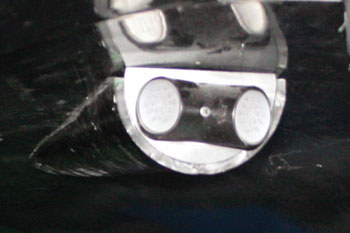 close view of two pulsar LED fixtures incased in a black plastic on top of tube interior of Black Hole Water Slide, Wet 'n Wild - Orlando, Florida, USA
