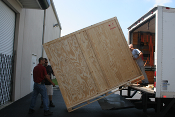Mayor Slayor animated Custom Ropelight Sculpture in crate being loaded up in a delivery truck from Techni-Lux to LightmosFEAR - Fright Fest, Six Flags New England - Agawam, Massachusetts, USA