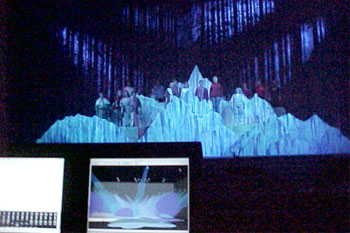 close up console with two built-in monitors showing simulation of stage and lights, white mountainous prop with people on it with soft blue spot lights on the and the mountain, Gabriel's Christmas Story, Calvary Orlando, Winter Park, Florida, USA